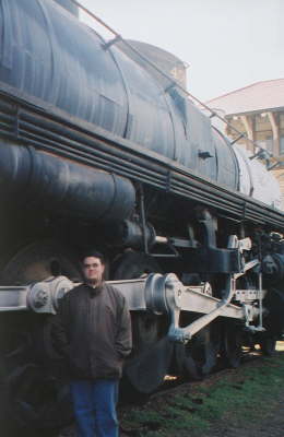 Chris by a train.